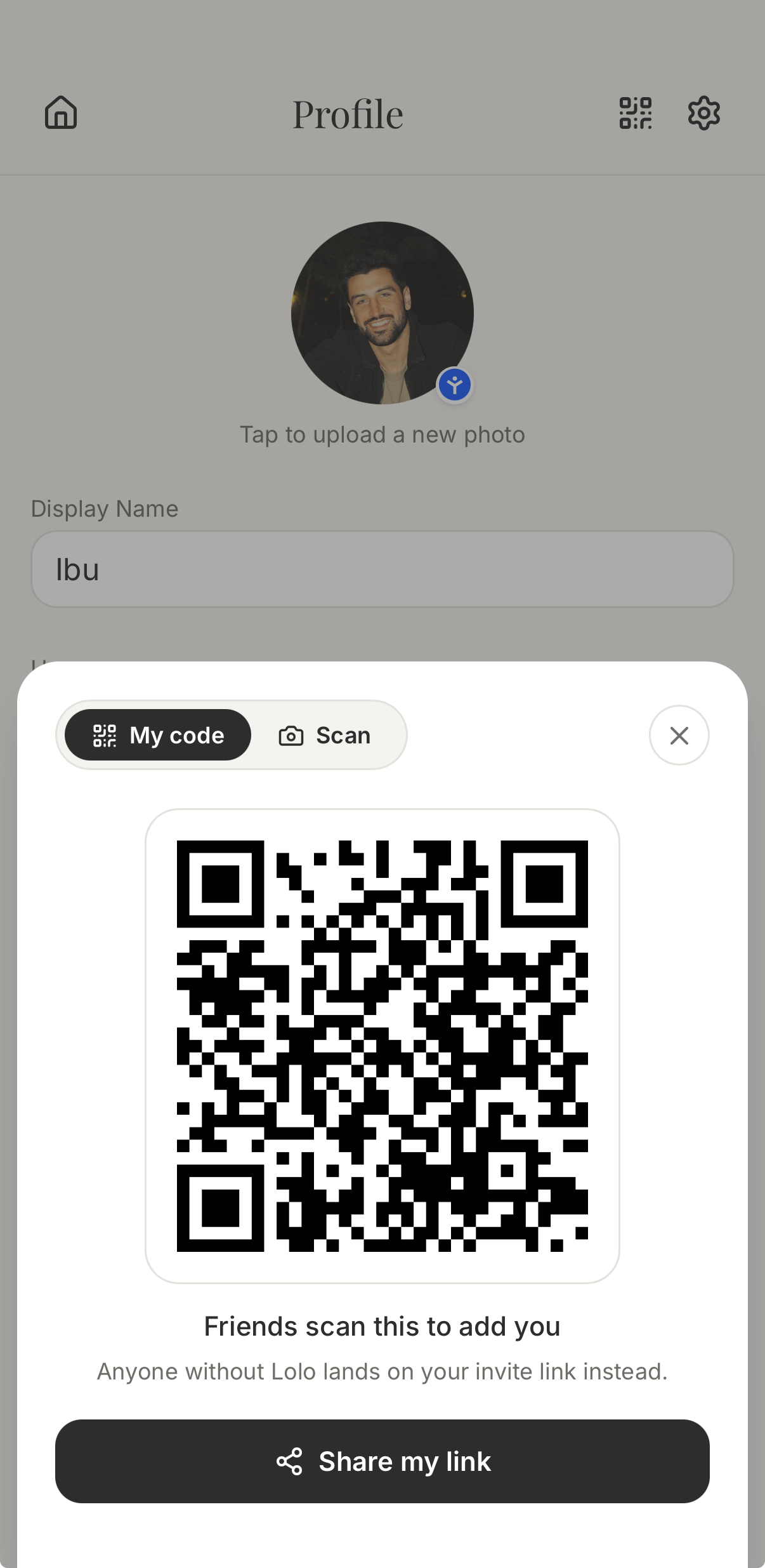 Lolo profile screen showing a personal QR code that friends can scan to add the user, plus a share-link action.