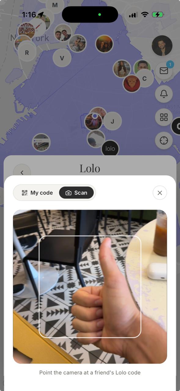 Lolo QR scanner open over the map with the Scan tab selected and a camera frame ready to scan a friend's Lolo code.